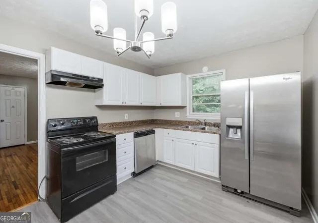 Photo 4 of Single family home for sale at 997 Pineglen Dr, Forest Park, GA 30297 | MLS# 10807246 | Listing updated on 2026-09-12