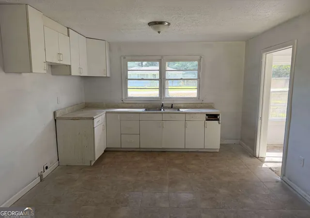 Photo 3 of Single family home for sale at 53 Howell Dr Sw, Atlanta, GA 30331 | MLS# 10835400 | Listing updated on 2026-09-21
