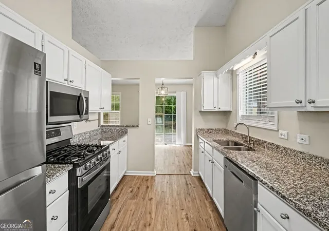 Photo 4 of Single family home for sale at 911 Riverstone Wy, Woodstock, GA 30188 | MLS# 10835071 | Listing updated on 2026-09-11