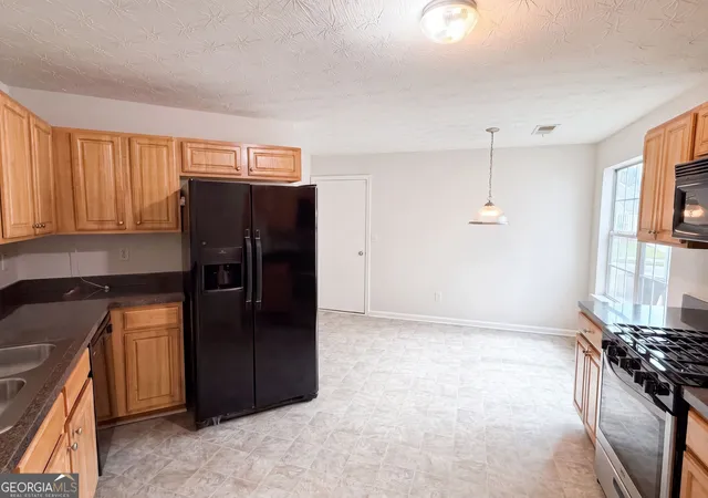 Photo 2 of Sale Pending at 55 Lassiter Dr, Covington, GA 30016 | MLS# 10822457 | Listing updated on 2026-08-30