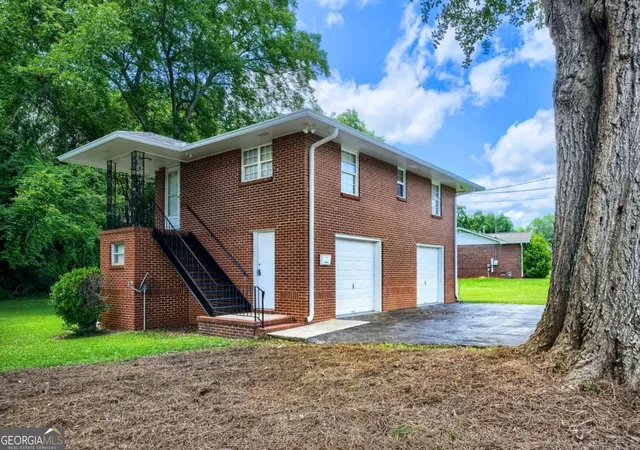 Photo 3 of Single family home for sale at 1 North Ave, Hampton, GA 30228 | MLS# 10793885 | Listing updated on 2026-08-22