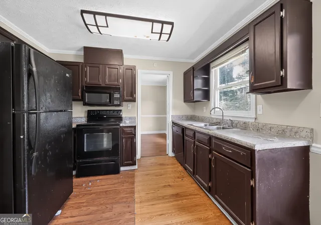 Photo 3 of Single family home for sale at 575 Oak Springs Dr Nw, Lawrenceville, GA 30043 | MLS# 10807976 | Listing updated on 2026-08-31