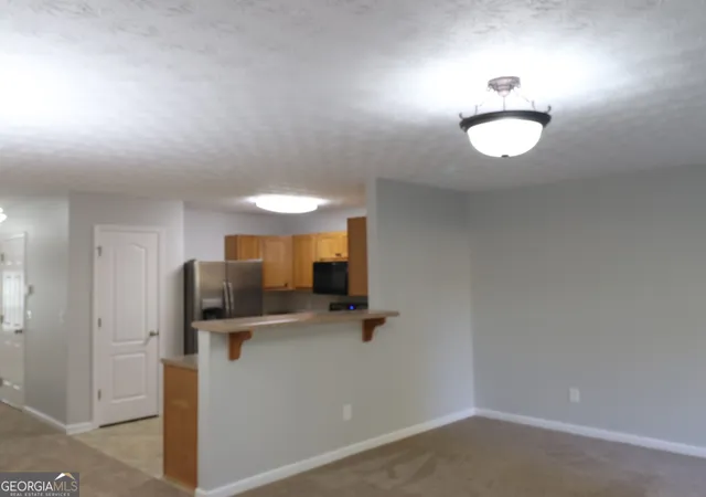 Photo 3 of Townhouse for sale at 755 Magnolia Gardens Walk, Mcdonough, GA 30253 | MLS# 10823079 | Listing updated on 2026-10-04