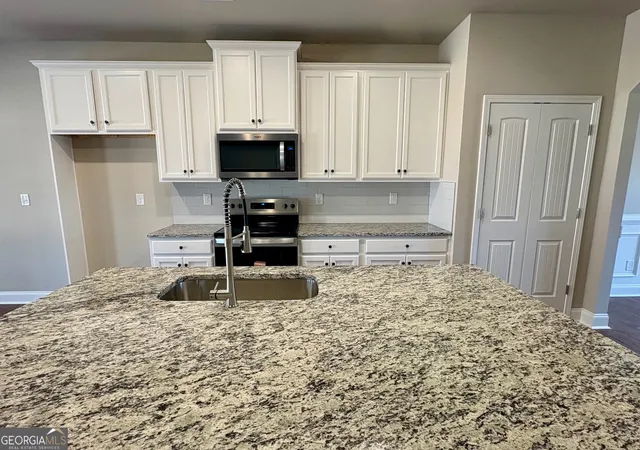 Photo 3 of Single family home for sale at 1046 Lakeview Oaks Ct #20-B, Grayson, GA 30017 | MLS# 10785475 | Listing updated on 2026-10-07