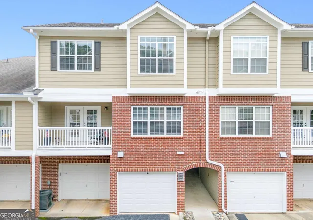 Photo 1 of Townhouse for sale at 5106 Woodland Ln, Alpharetta, GA 30009 | MLS# 10816361 | Listing updated on 2026-09-10