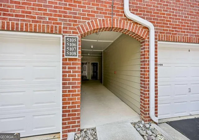 Photo 3 of Townhouse for sale at 5106 Woodland Ln, Alpharetta, GA 30009 | MLS# 10816361 | Listing updated on 2026-09-10