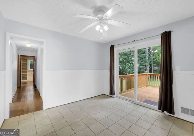 Photo 3 of Single family home for sale at 1563 Rockbridge Rd, Stone Mountain, GA 30087 | MLS# 10820131 | Listing updated on 2026-09-03