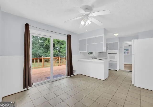Photo 3 of Single family home for sale at 1563 Rockbridge Rd, Stone Mountain, GA 30087 | MLS# 10820131 | Listing updated on 2026-09-30