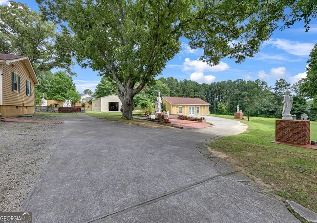 Photo 3 of Single family home for sale at 1242 Cooper Rd, Snellville, GA 30078 | MLS# 10796369 | Listing updated on 2026-08-09