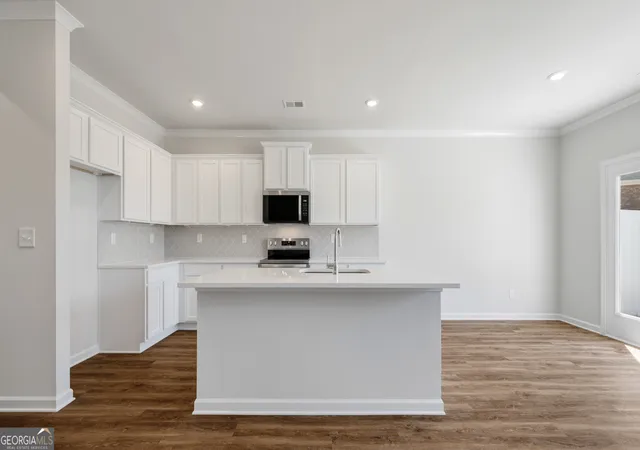 Photo 4 of Townhouse for sale at 1408 Gray Branch Dr, Lawrenceville, GA 30045 | MLS# 10537142 | Listing updated on 2026-09-09