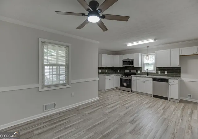 Photo 4 of Single family home for sale at 4445 Lake Forest Dr, Oakwood, GA 30566 | MLS# 10819756 | Listing updated on 2026-10-10