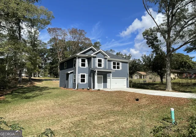 Photo 3 of Sale Pending at 1669 W Poplar St, Griffin, GA 30224 | MLS# 10672392 | Listing updated on 2026-03-04