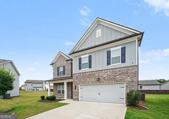 2nd image of 612 Auburn Crossing Dr, Auburn, GA 30011 | MLS# 10776508