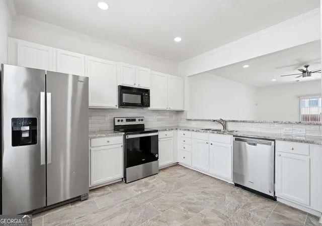 Photo 2 of Townhouse for sale at 3023 Deerborne Ct SW, Atlanta, GA 30331 | MLS# 10798565 | Listing updated on 2026-08-06