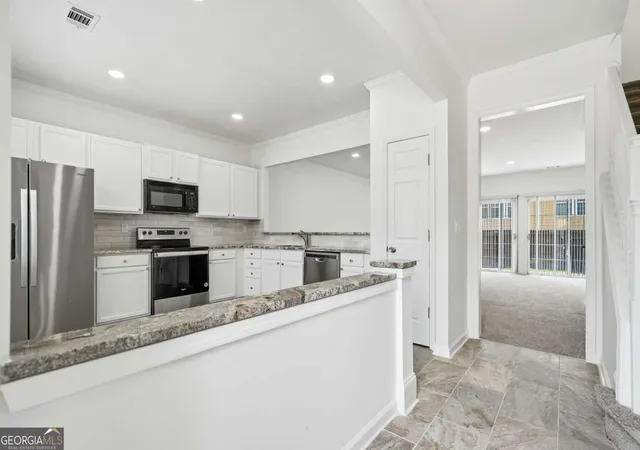 Photo 4 of Townhouse for sale at 3023 Deerborne Ct SW, Atlanta, GA 30331 | MLS# 10798565 | Listing updated on 2026-08-06