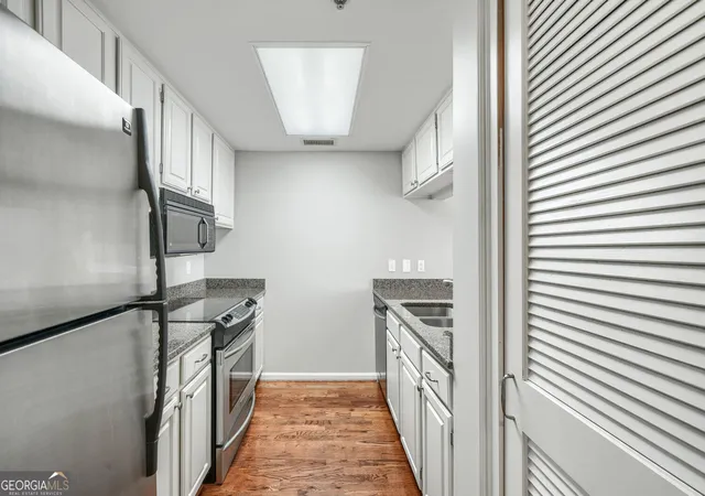 Photo 2 of Condo for sale at 3481 Lakeside Dr NE #2603, Atlanta, GA 30326 | MLS# 10809071 | Listing updated on 2026-09-05