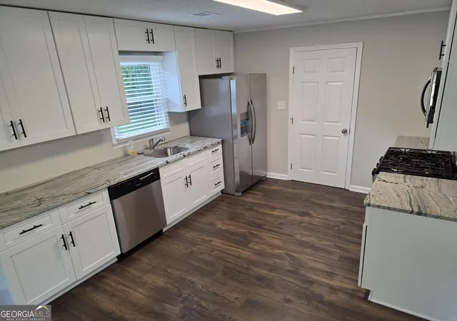 Photo 3 of Single family home for sale at 1326 Jimi Ln NW, Conyers, GA 30012 | MLS# 10830081 | Listing updated on 2026-09-03