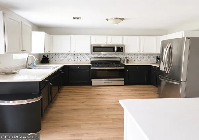 Photo 3 of Single family home for sale at 6009 Riveroak Ter, College Park, GA 30349 | MLS# 10802556 | Listing updated on 2026-08-27