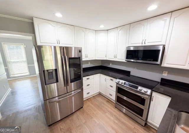 Photo 2 of Single family home for sale at 1876 Geyser Tr, Lawrenceville, GA 30044 | MLS# 10772135 | Listing updated on 2026-09-19