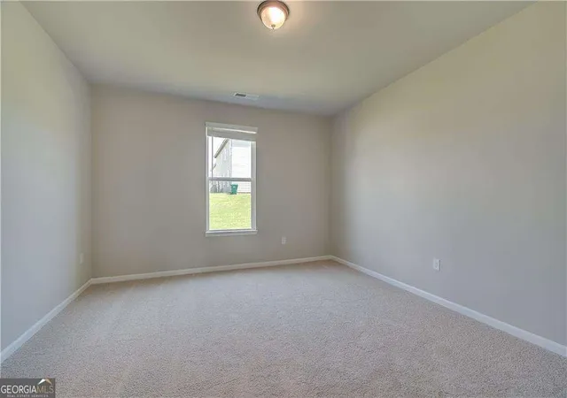 4th image of 733 Dunlake Wy, Locust Grove, GA 30248 | MLS# 10802378