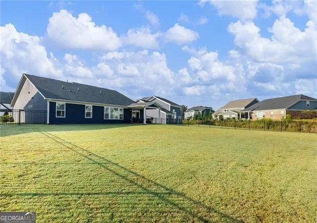 Photo 3 of Single family home for sale at 627 Michigan Cir, Hoschton, GA 30548 | MLS# 10825631 | Listing updated on 2026-10-10