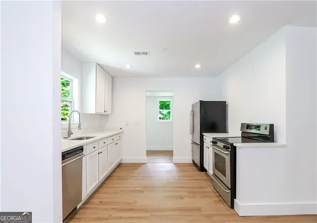 Photo 3 of Single family home for sale at 2130 Donald Lee Hollowell Pkwy Nw, Atlanta, GA 30318 | MLS# 10824710 | Listing updated on 2026-08-26
