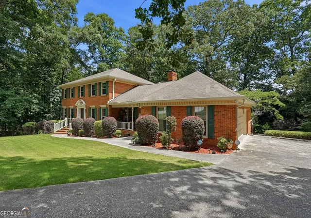Photo 2 of Single family home for sale at 5027 Castlewood Dr Sw, Lilburn, GA 30047 | MLS# 10826310 | Listing updated on 2026-09-17