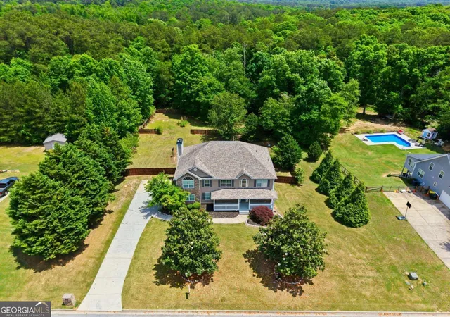 Photo 2 of Single family home for sale at 65 Ashford Dr, Oxford, GA 30054 | MLS# 10815563 | Listing updated on 2026-09-19