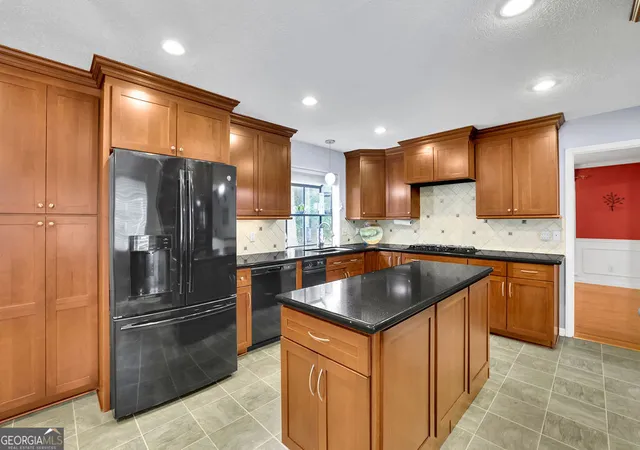 Photo 3 of Single family home for sale at 1677 Heritage Dr, Snellville, GA 30078 | MLS# 10834103 | Listing updated on 2026-09-14