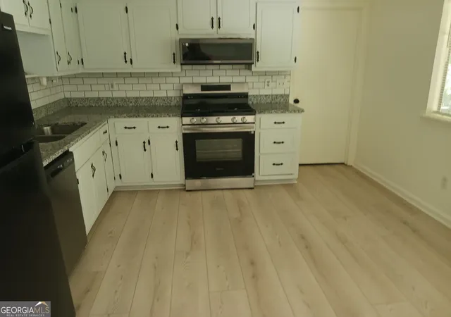 Photo 3 of Single family home for sale at 1063 Salisbury Trl, Riverdale, GA 30296 | MLS# 10823639 | Listing updated on 2026-09-18