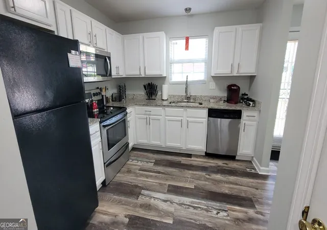 Photo 3 of Townhouse for sale at 2173 Wind Gate Ct, Lithonia, GA 30058 | MLS# 10803753 | Listing updated on 2026-07-25