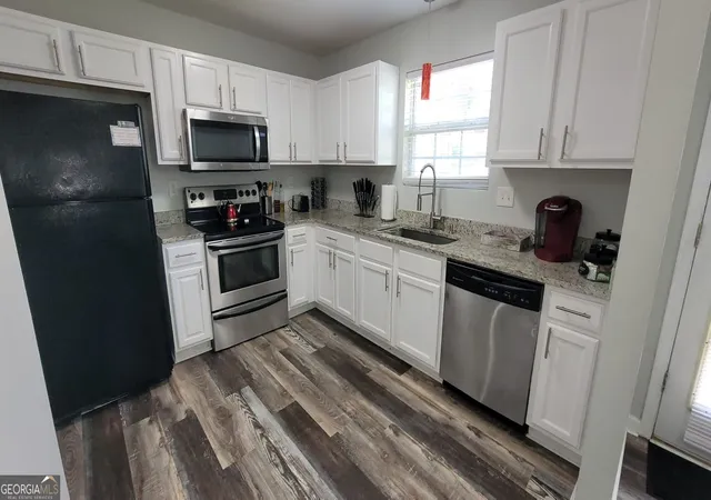 Photo 3 of Townhouse for sale at 2173 Wind Gate Ct, Lithonia, GA 30058 | MLS# 10803753 | Listing updated on 2026-07-25