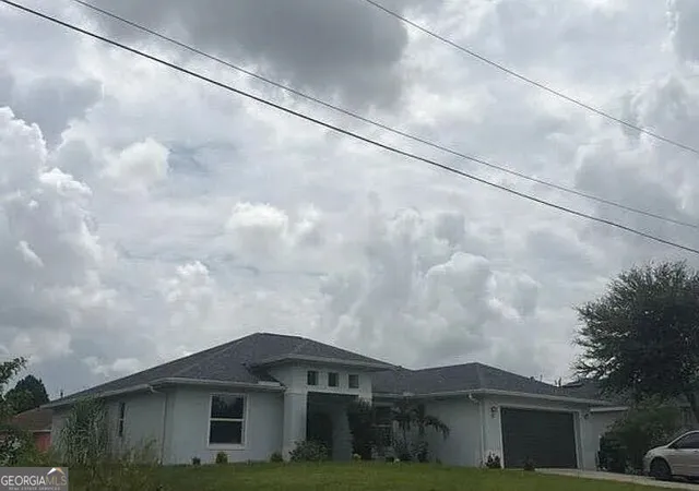 2nd image of 57 Bruce Ave S, Lehigh Acres, FL 33976 | MLS# 10832791