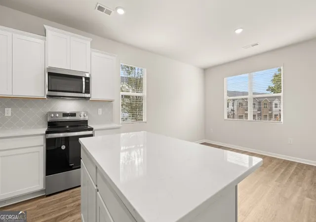 Photo 4 of Townhouse for sale at 5009 Oakwood Road, Stone Mountain, GA 30088 | MLS# 10687534 | Listing updated on 2026-10-06