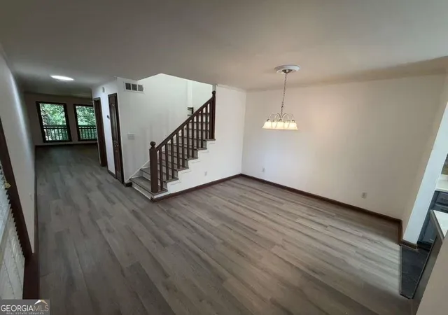 Photo 3 of Townhouse for sale at 1702 Pine Tree Dr, Buford, GA 30518 | MLS# 10833592 | Listing updated on 2026-09-12