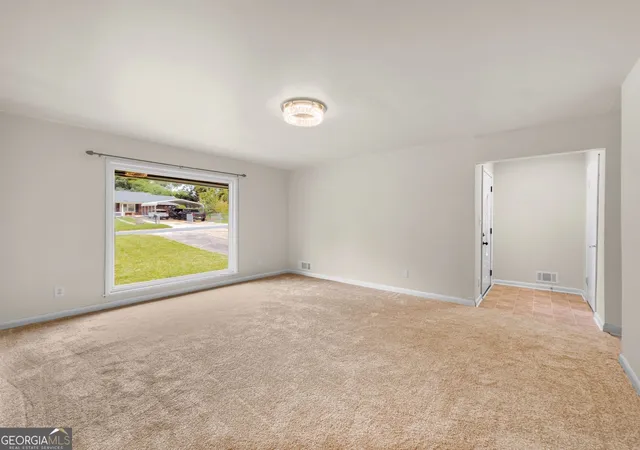 Photo 3 of Single family home for sale at 565 Wavelyn Wy, Riverdale, GA 30274 | MLS# 10812368 | Listing updated on 2026-09-12