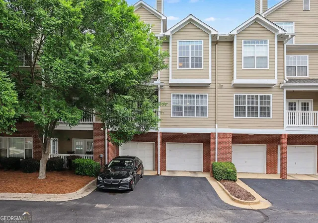 Photo 1 of Townhouse for sale at 6115 Woodland Ln, Alpharetta, GA 30009 | MLS# 10763145 | Listing updated on 2026-08-22