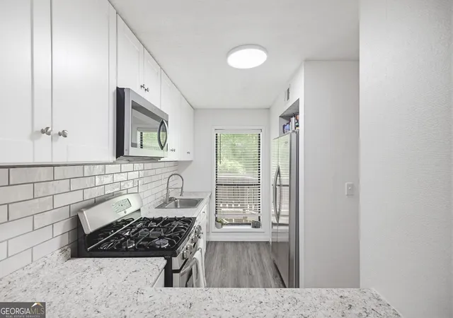 Photo 2 of Condo for sale at 703 Woodcliff Dr, Sandy Springs, GA 30350 | MLS# 10820897 | Listing updated on 2026-08-20