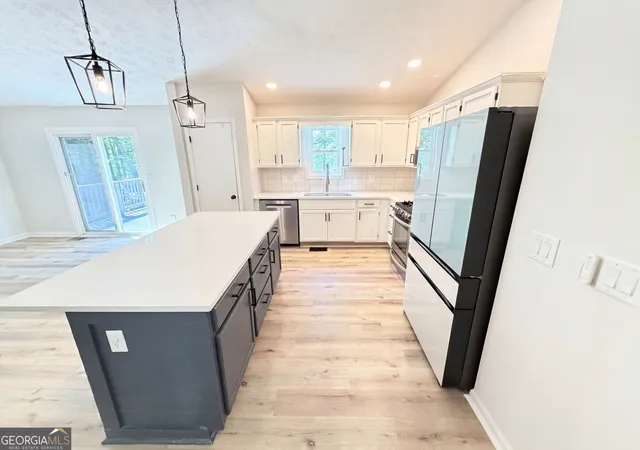 Photo 2 of Single family home for sale at 1327 Towne Harbor Trl, Woodstock, GA 30189 | MLS# 10737309 | Listing updated on 2026-09-18