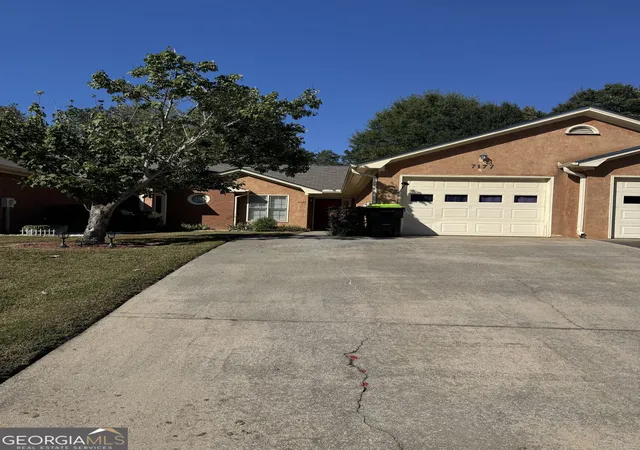 Photo 1 of Townhouse for sale at 7177 Woodridge Ln, Union City, GA 30291 | MLS# 10874509 | Listing updated on 2026-10-30