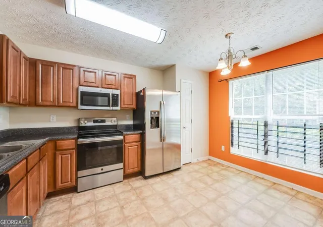 Photo 3 of Townhouse for sale at 3542 Waldrop Trl, Decatur, GA 30034 | MLS# 10829059 | Listing updated on 2026-09-07