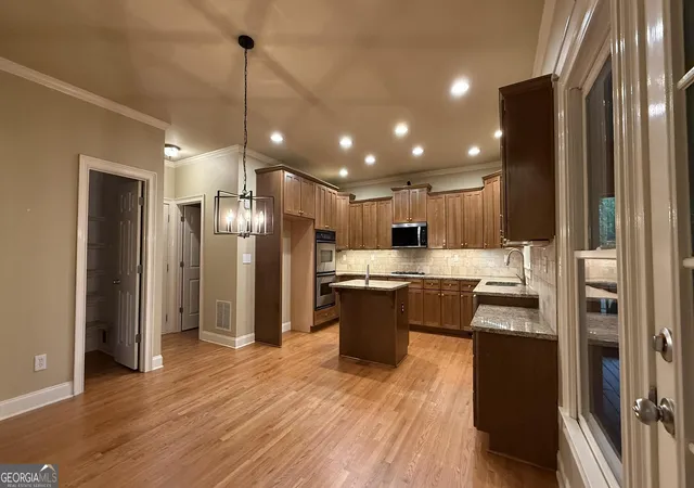 Photo 3 of Single family home for sale at 4920 Magnolia Crk Dr, Cumming, GA 30028 | MLS# 10808393 | Listing updated on 2026-09-28