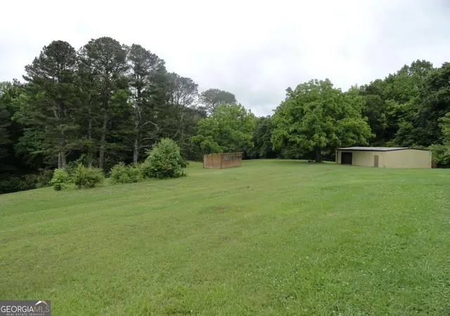 Photo 3 of Land for sale at 8664 Cumming Hwy, Canton, GA 30115 | MLS# 10581894 | Listing updated on 2026-08-07