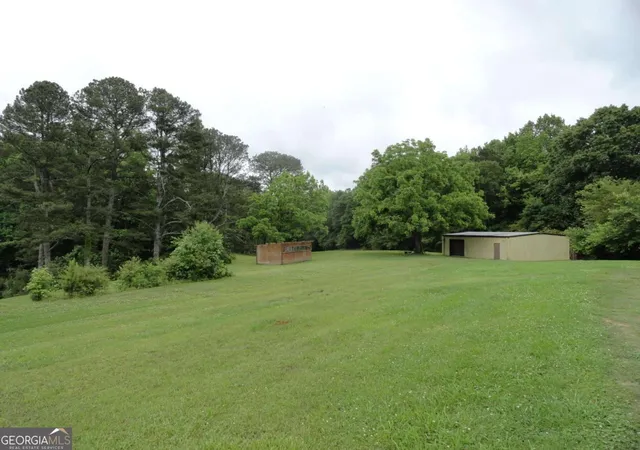 Photo 3 of Land for sale at 8664 Cumming Hwy, Canton, GA 30115 | MLS# 10581894 | Listing updated on 2026-08-07