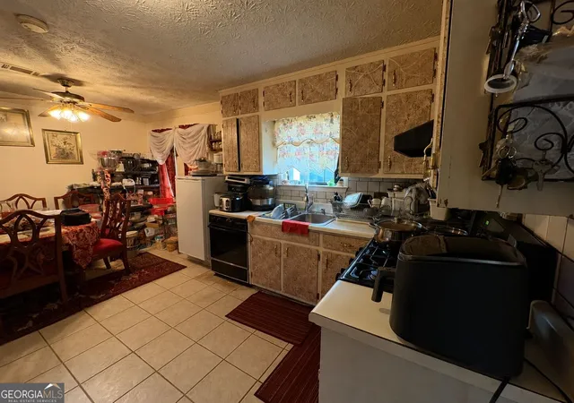 Photo 3 of Single family home for sale at 7571 Kevin Pl, Jonesboro, GA 30236 | MLS# 10833459 | Listing updated on 2026-09-18