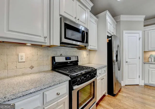 Photo 4 of Townhouse for sale at 5915 Vista Brk Dr, Suwanee, GA 30024 | MLS# 10755601 | Listing updated on 2026-09-19