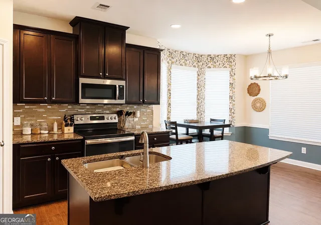Photo 4 of Townhouse for sale at 7527 Stone Crk Path, Lithonia, GA 30038 | MLS# 10796492 | Listing updated on 2026-09-03