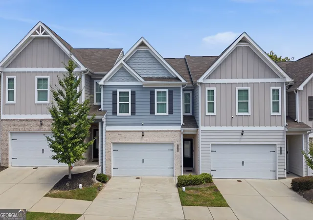 Photo 1 of Townhouse for sale at 7548 Knoll Hollow Rd, Lithonia, GA 30058 | MLS# 10831279 | Listing updated on 2026-09-05