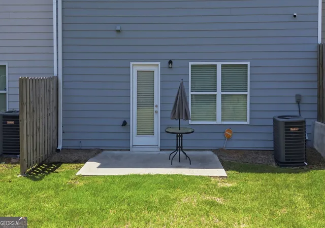 Photo 3 of Townhouse for sale at 7548 Knoll Hollow Rd, Lithonia, GA 30058 | MLS# 10831279 | Listing updated on 2026-09-05