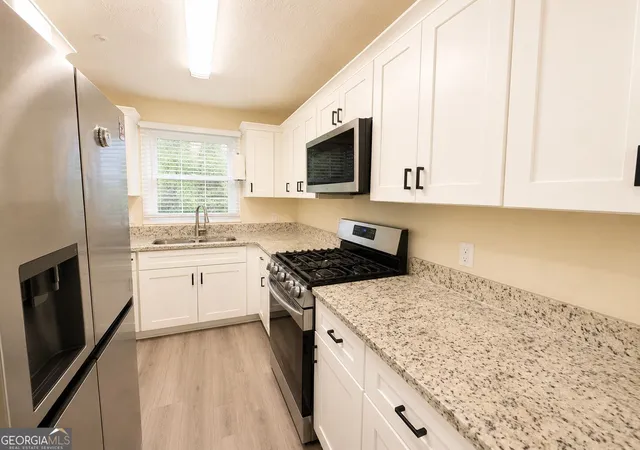 Photo 3 of Townhouse for sale at 2244 Wellington Cir, Lithonia, GA 30058 | MLS# 10829112 | Listing updated on 2026-09-04